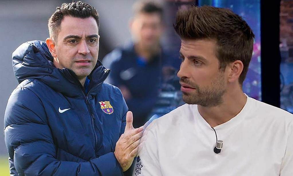 Huấn luyện viên đội Barca - Xavi và trung vệ Pique 